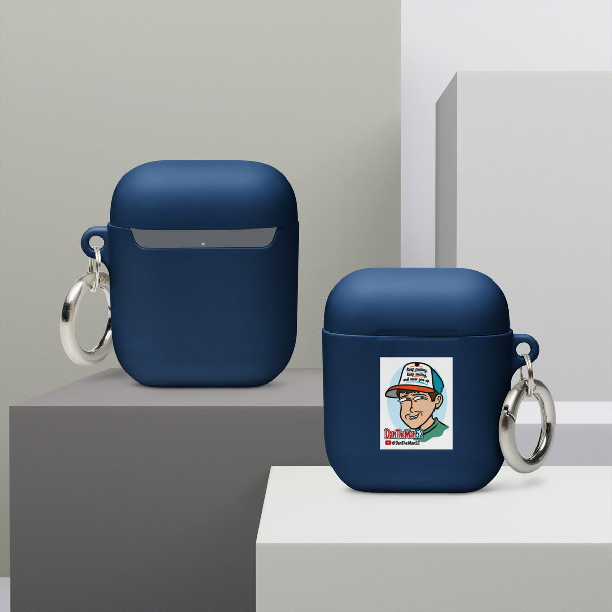 Get a two-in-one deal with these Rubber Case for AirPods®: an impact-absorbing protector for your earbuds and a stylish accessory you can attach to your clothes and bags with a metal carabiner. This case is made from a durable TPU material and works with both wireless and regular AirPod® chargers. • Thermoplastic polyurethane (TPU) material • Impact-absorbing • Protects AirPods® from bumps, drops, and scratches • Comes with a metal carabiner for easy carrying • Compatible with both wireless and a regular ch