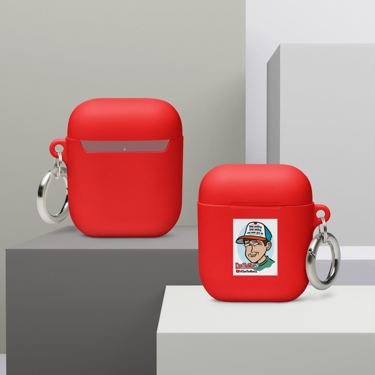Get a two-in-one deal with these Rubber Case for AirPods®: an impact-absorbing protector for your earbuds and a stylish accessory you can attach to your clothes and bags with a metal carabiner. This case is made from a durable TPU material and works with both wireless and regular AirPod® chargers. • Thermoplastic polyurethane (TPU) material • Impact-absorbing • Protects AirPods® from bumps, drops, and scratches • Comes with a metal carabiner for easy carrying • Compatible with both wireless and a regular ch