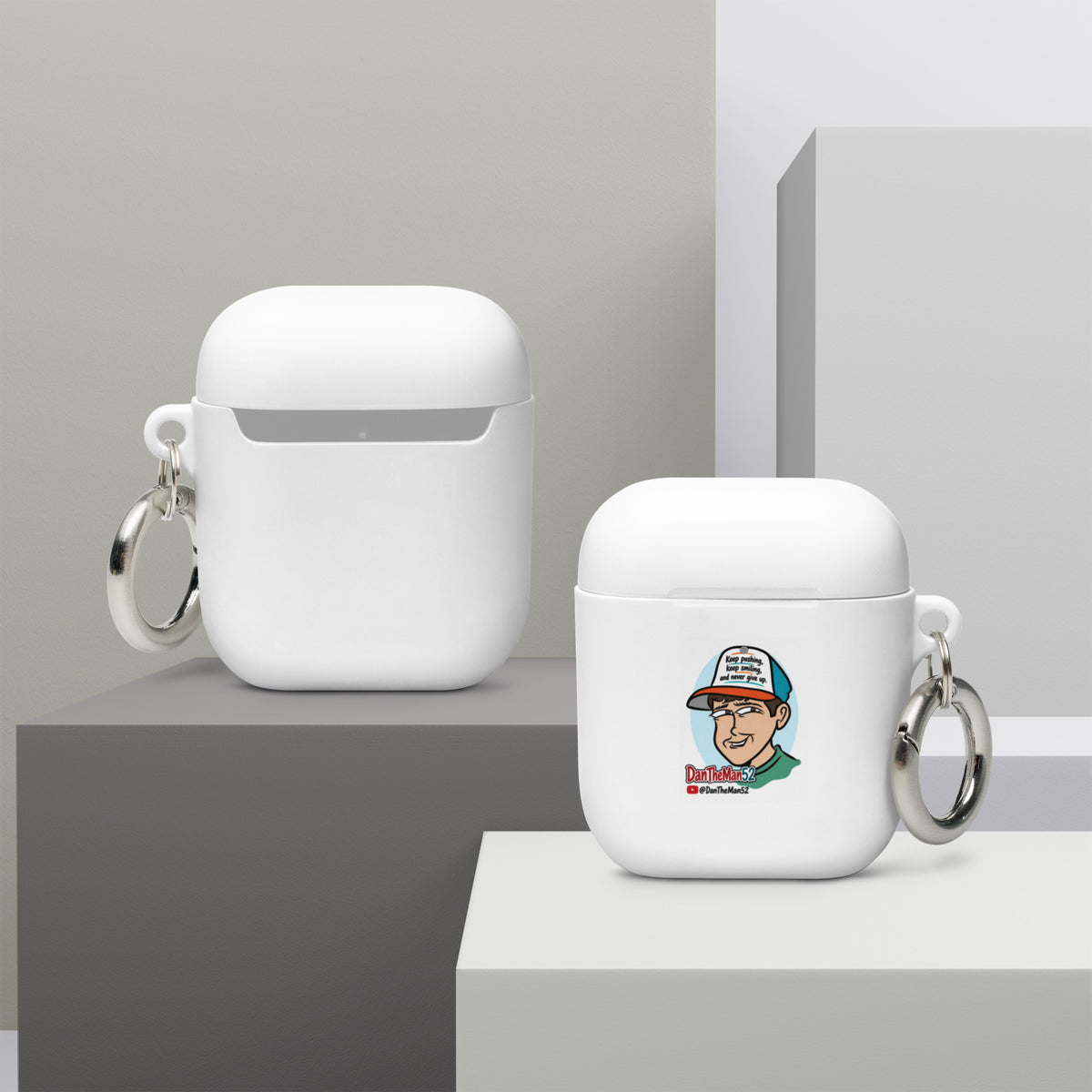 Get a two-in-one deal with these Rubber Case for AirPods®: an impact-absorbing protector for your earbuds and a stylish accessory you can attach to your clothes and bags with a metal carabiner. This case is made from a durable TPU material and works with both wireless and regular AirPod® chargers. • Thermoplastic polyurethane (TPU) material • Impact-absorbing • Protects AirPods® from bumps, drops, and scratches • Comes with a metal carabiner for easy carrying • Compatible with both wireless and a regular ch